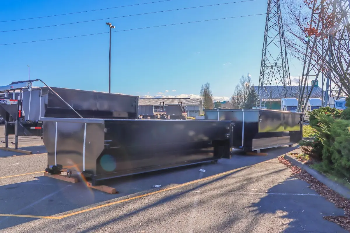 Roll-off dumpster ready for waste disposal at job site for Commercial Dumpster Rental in Tecumseh